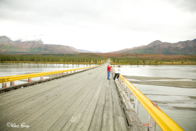 Walking Across River Bridge