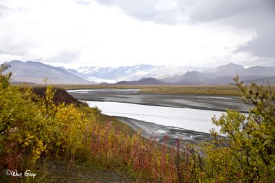 River & Glacier in Rain