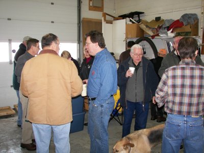 A large crowd gathers to share in the coffee & donuts, prior to the workshop beginning