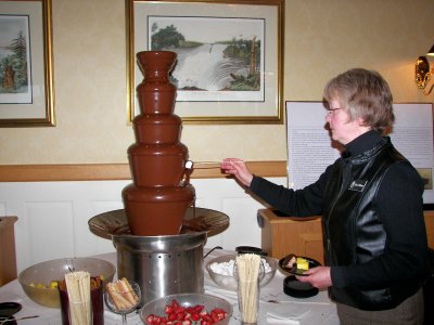Sharon makes a visit to the chocolate fountain.
