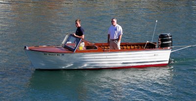 The tow boat has Jeff (at the wheel) & Tom in a Lyman classic outboard.