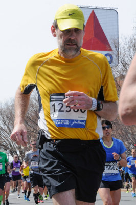 Running past the Citgo sign at mile 25