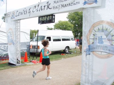 Kristen crossing the finish line