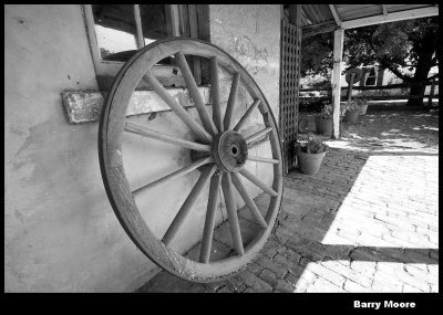 Wagon wheel on the homestead wall