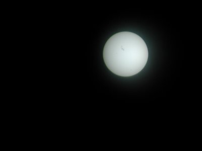 The view as seen through the binoculars using a mylar solar filter.

20040721-001.JPG
