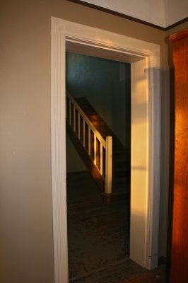 White door with staircase