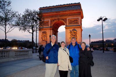 Jim & Glynda, Dick & Theo at the Arc de Triomphe at dusk