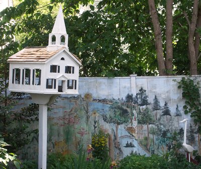 Birdhouse and Painted Fence