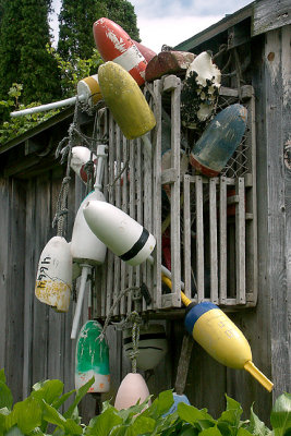 Lobster buoys on shed