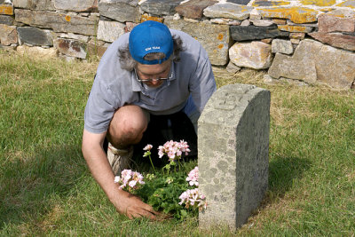 Keith Mills Planting Geraniums on Celia Thaxter's Grave