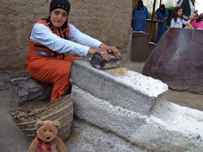 Egyptian peasant demonstrating wheat grinding