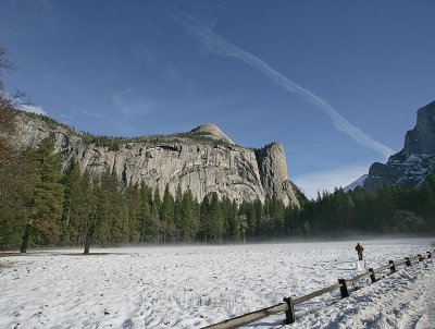 Royal Arches,a figure,contrails and Ahwahnee Meadow