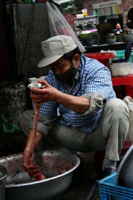 Saussage made on the pavement -  Hanoi - Vietnam