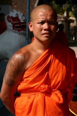 As lots of Asian people, monks also wear the tatoos  - Luang Prabang - Laos