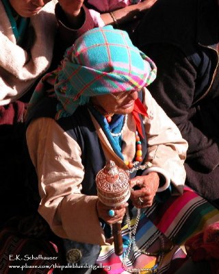 Woman with Prayer Wheel, Leh Ladak India, Thiske Monestary festival