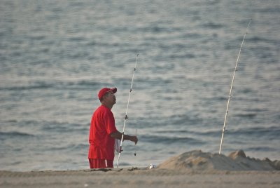fisherman checking his lines