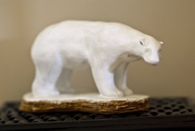 a polar bear - Clay/patina