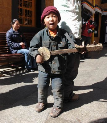 Little musician in Tsamkhung Nunnery