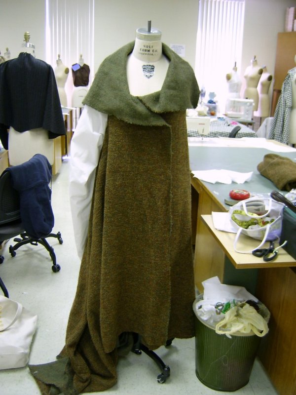Coat on Form with Muslin Sleeve
