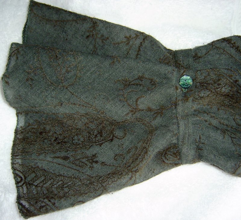 Cuff Buttoned above Flounce