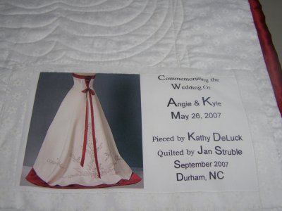 Label on back of wedding dress quilt