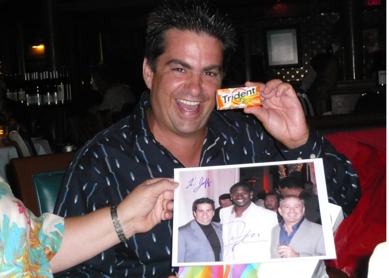 Jeff with signed LaDainian photo.jpg