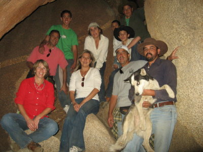 Group in the cave with Jeanette & Reina the Dog