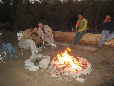 Allison & Werner having a cuddle around the fire