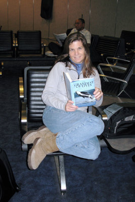 Reading a book on orcas between flights at LAX