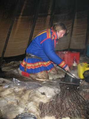 Michael cooks some reindeer for the guests