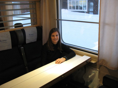 Cynthia on the train, ready to go to Norway