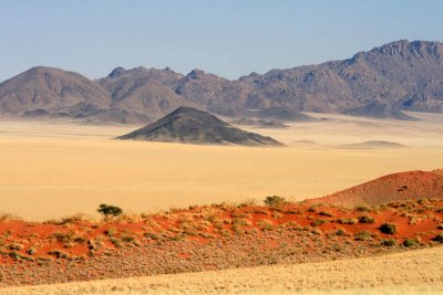 Sand dunes with island hills in the Namib desert