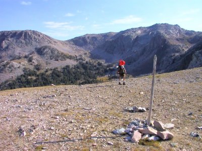 Trudging the 90lb-Pack, Takes Dick a Moment Longer