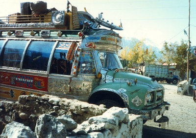 Bus with airplane over cab