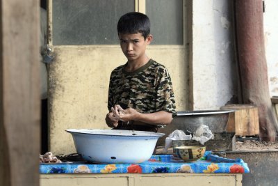 boy preparing kabab