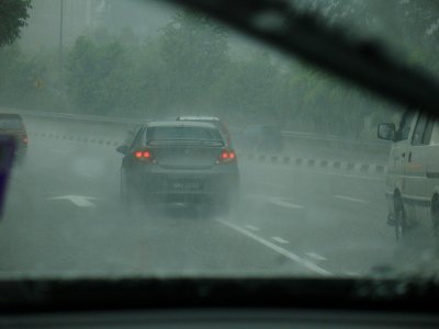 Driving in the rain by Tabrizi