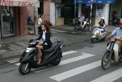 pretty girl on a motorbike in Saigon