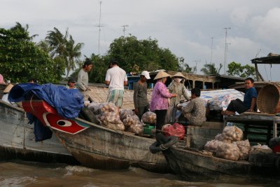 Cai Be floating market in Mekong Delta