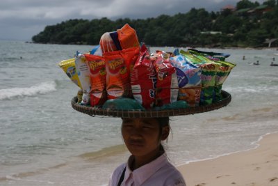 lots of saleswomen on the beach