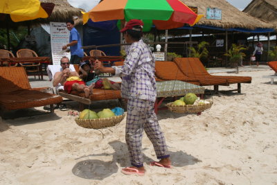 lots of saleswomen on the beach