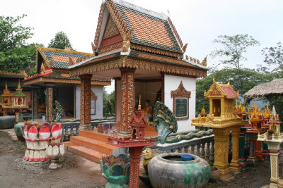 lots of shrines on road to Phnom Penh