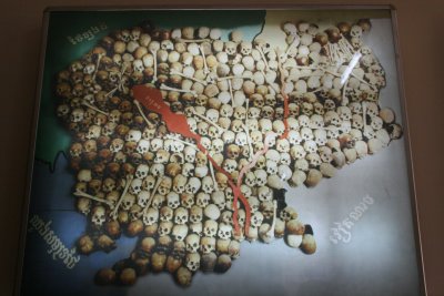 Map of Cambodia made of the skulls of the dead and framed by disturbing statistics: 3 million dead or missing