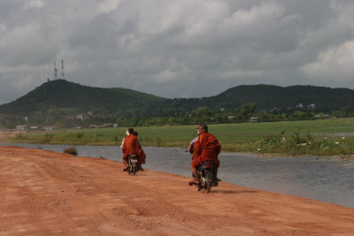 monks on motorbikes
