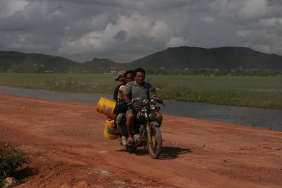 many cheerful people on motorbike