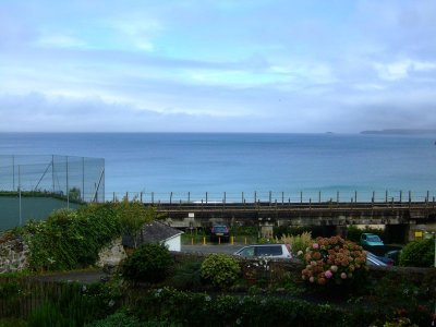 The view from just outside our place. A lovely view of the train tracks obscuring the beach.