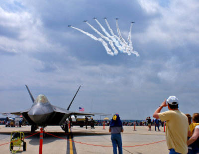 F22 under flight of p51's