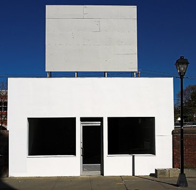 White Building with Billboard