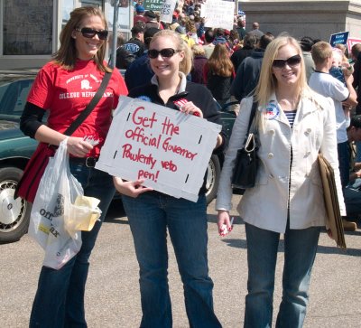 Designer clothes, glasses, handbags and political views-tom