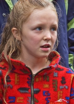 A captivated girl in the crowd