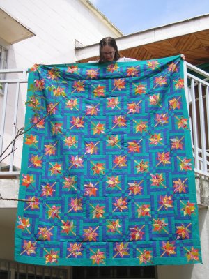 My first quilt - a queen-size maple-leaf quilt made in Cameroon.